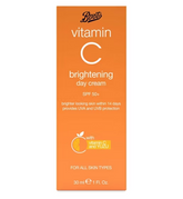 Orange packaging of Boots vitamin C brightening day cream on a white background