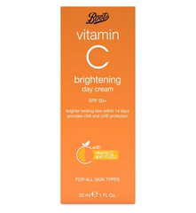 Orange packaging of Boots vitamin C brightening day cream on a white background