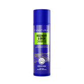 Blue shampoo bottle with green label on a white background