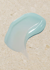 Blue paint smear on beige sand