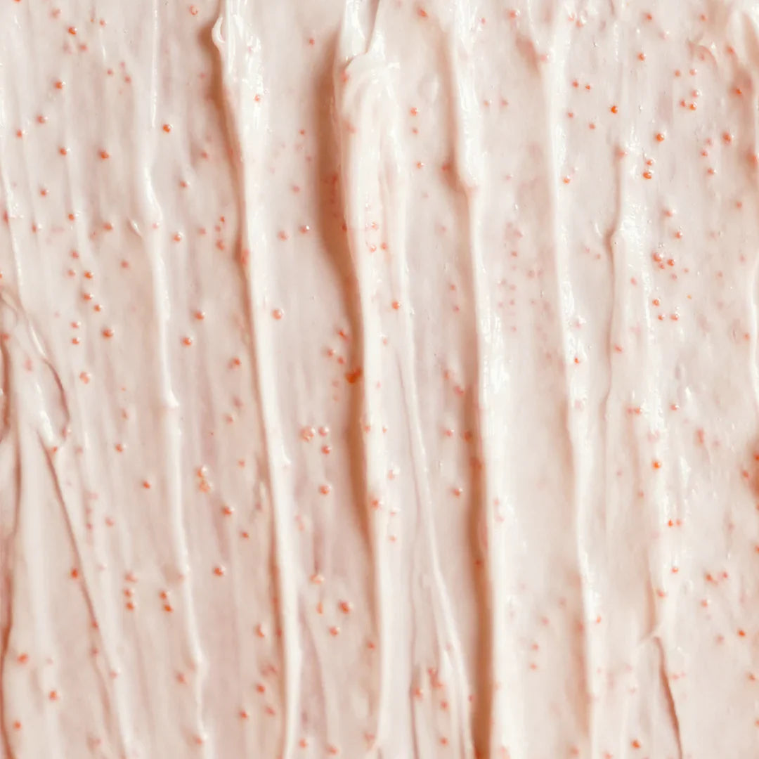 Close-up of pink textured fabric with small specks