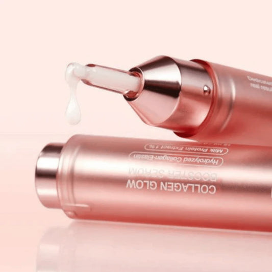 Pink collagen serum bottle with dropper on a light pink background