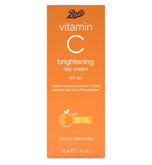 Orange packaging of Boots vitamin C brightening day cream on a white background