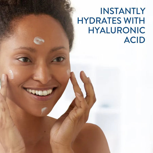 Woman applying cream to her face with text 'Instantly hydrates with hyaluronic acid' on a white background