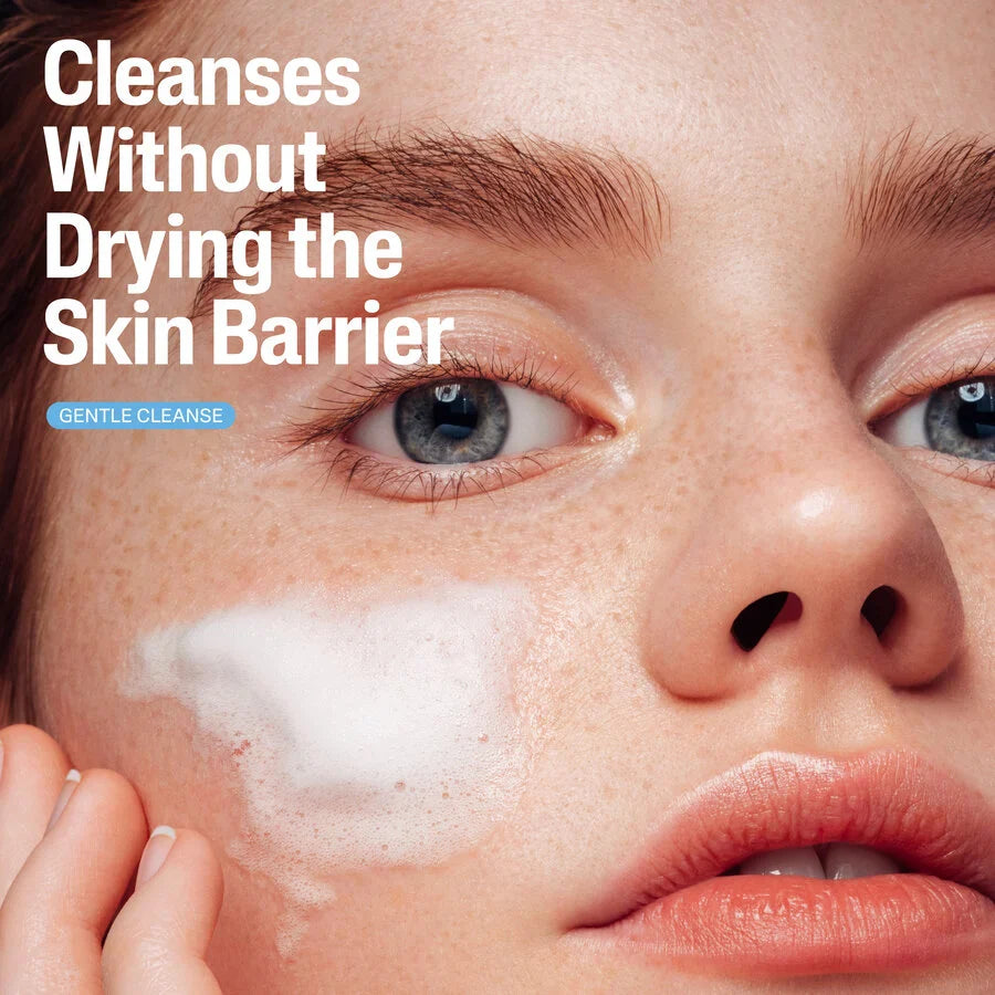 Close-up of a person applying a skincare product with text about skin barrier cleansing.