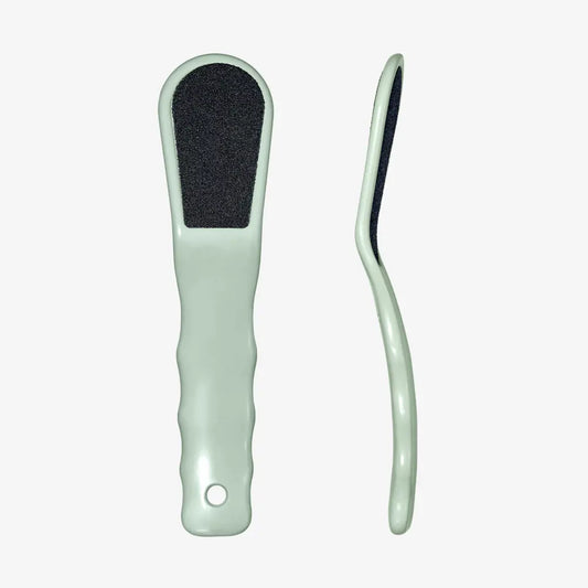 Two shoe care tools with a white background