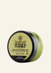 The Body Shop Hemp Heavy-Duty Face Protector jar on a beige background