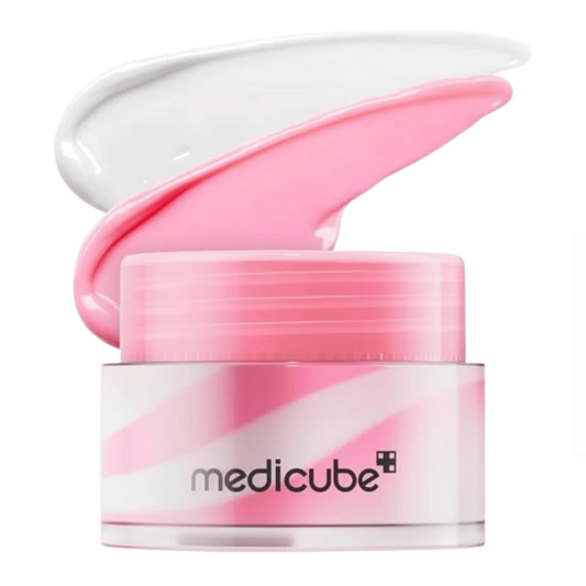 Pink cream jar with open lid on a white background, featuring the Medicube brand.