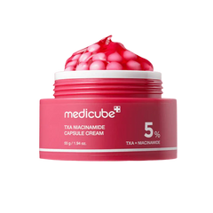 Pink jar of Medicube TXA Niacinamide Capsule Cream with a white cap on a white background