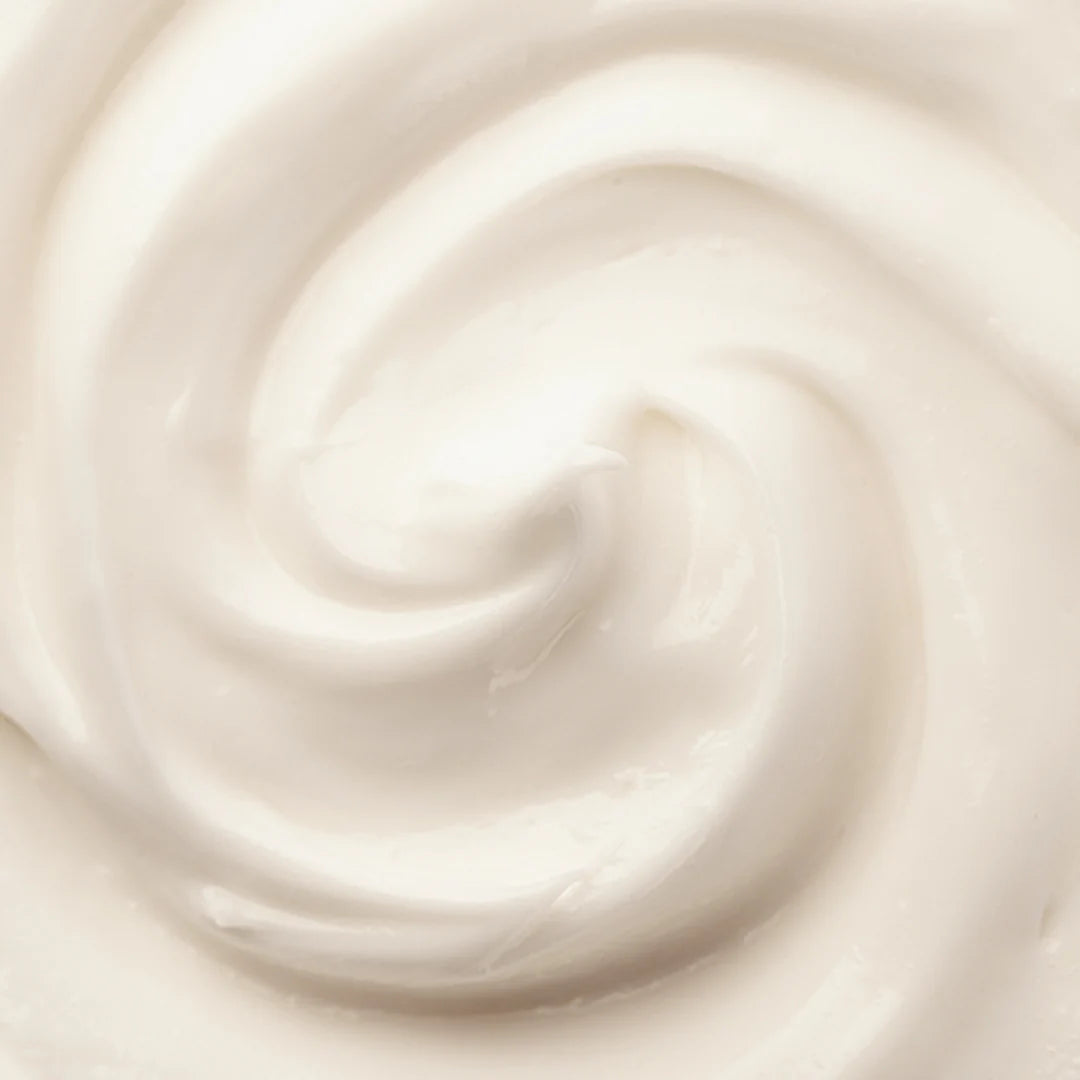 Close-up of a swirl of light beige cream
