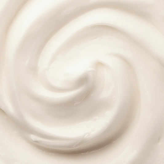 Close-up of a swirl of light beige cream